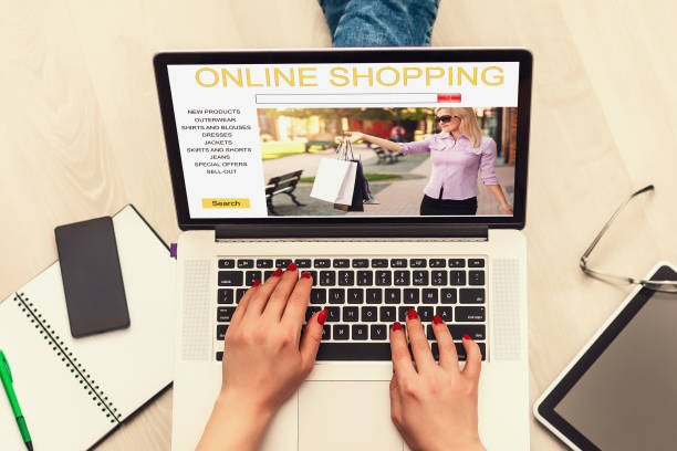 istock Girl shopping on-line on laptop, using online store, shopping through electronic application, signing in on website, close up, rear view 1273613306