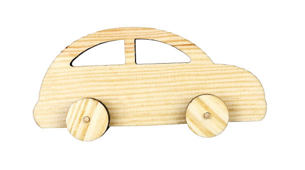 istock Wooden small toy car isolated on white 1273628859