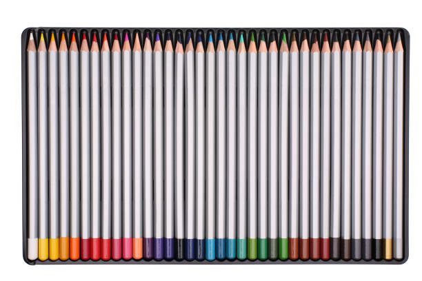 istock Color pencils in case isolated on white background 1273628895