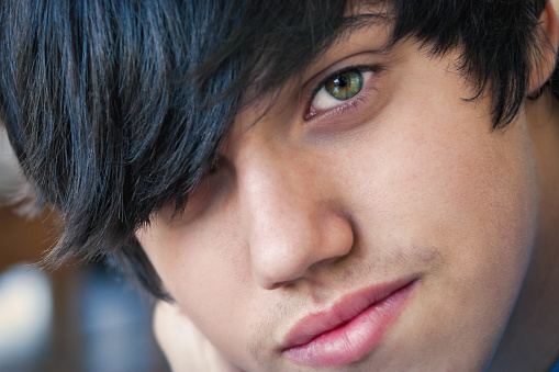 Caucasian teenager with green eyes portrait