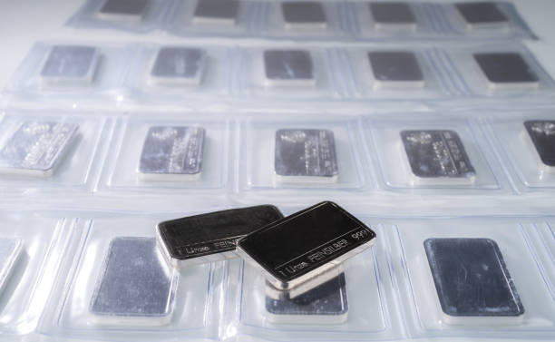 istock Minted silver bars weighing one troy ounce in plastic packaging and unpacked. 1273629227