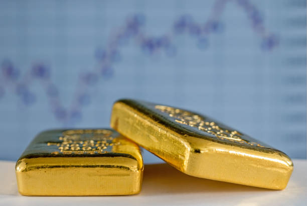 istock Gold bars on the background of the growth chart. 1273634166