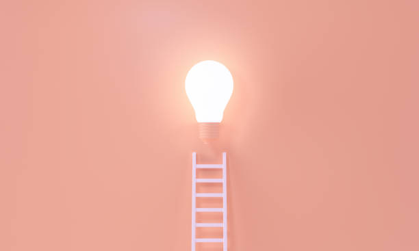 istock Ladder reaches up to a lit light bulb representing way to an Idea, creativity, invention concept. 3d rendering. 1273634744