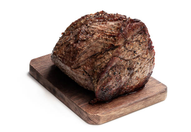 istock Roast beef on cutting board isolated on white 1273638945