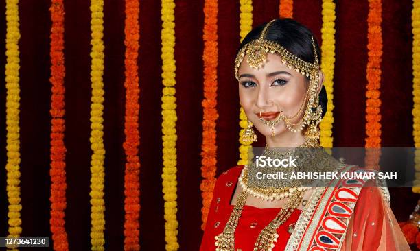Young Woman Wearing Traditional Indian Dress And Celebrating Diwali Stock Photo - Download Image Now