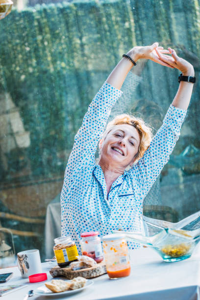 istock Blonde woman at breakfast time. 1273645285