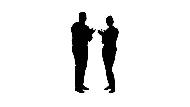 istock Silhouette One businessman and one businesswoman applauding 1273647705