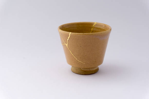 istock Kintsugi Japanese antique ceramic cup 1273649623