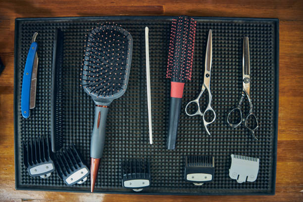 istock Clean and sanitised hair-grooming tools layed out on a table 1273656955