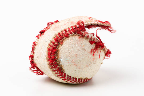 ripped and useless baseball ball - catching horizontal nobody baseballs imagens e fotografias de stock