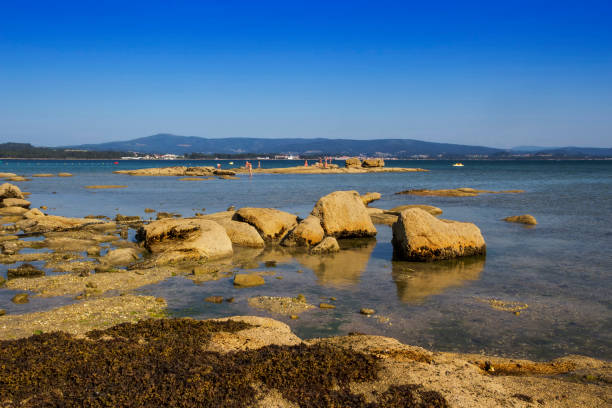 istock Coastal rocks on the beach 1273658287