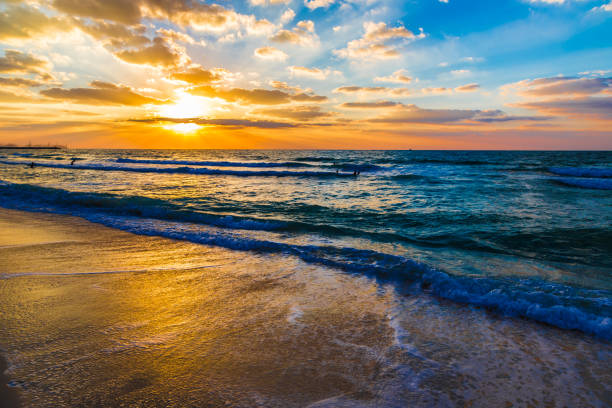 istock Beautiful sunset at the beach 1273659004