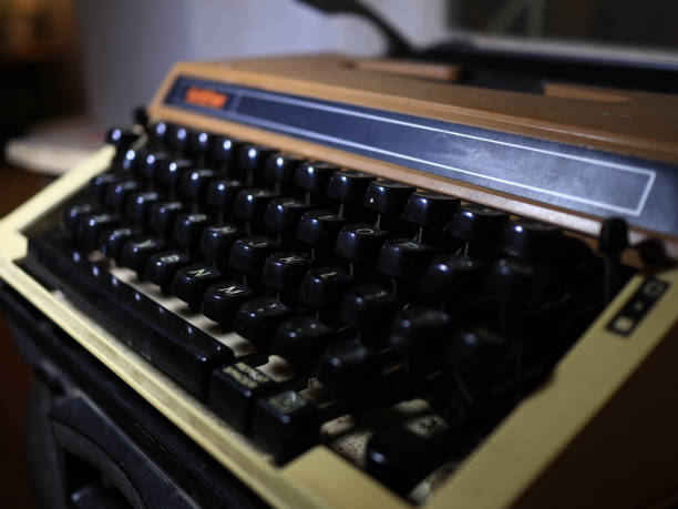 istock Close up of and selective focus image, vintage dirty typewriter letteters with copy space 1273659944