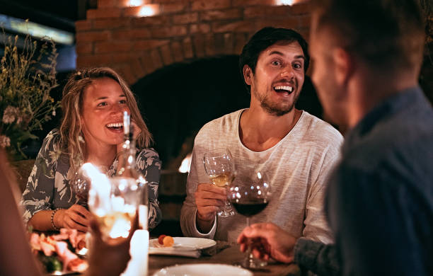istock Group of friends having dinner party 1273661266