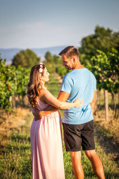 istock Pregnant woman looking at her husband 1273661326