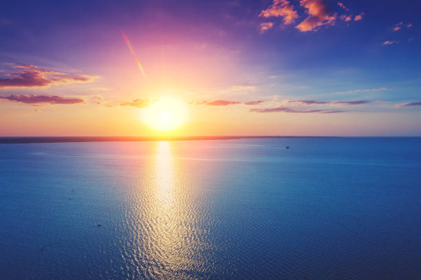 istock Colorful cloudy sky at sunset. Sunset over the sea. Gradient color. Sky texture. Abstract nature background 1273661370