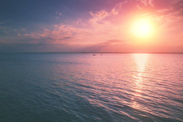 istock Colorful cloudy sky at sunset. Sunset over the sea. Gradient color. Sky texture. Abstract nature background 1273661462