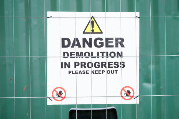 istock Demolition in progress keep out sign at construction building site 1273663302