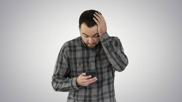 istock Stressed young man shocked surprised, horrified and disturbed, b 1273664511