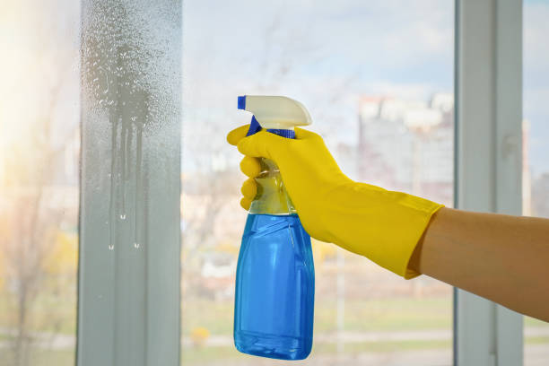 istock House cleaning. Cleaning dirty windows with detergent. Household concept. 1273665672