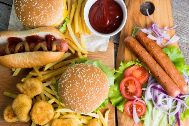 istock Fast food on the wood 1273666004