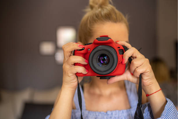 istock Woman photographer 1273666129
