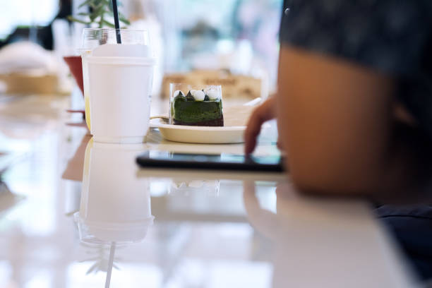 istock Matcha soft cake and break in coffee shop in Bangkok 1273667072