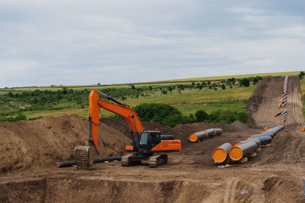 Construction works for gas pipeline Balkan stream in Bulgaria Construction works for gas pipeline Balkan stream in Bulgaria for South-East and Central European countries. bagger stock pictures, royalty-free photos & images