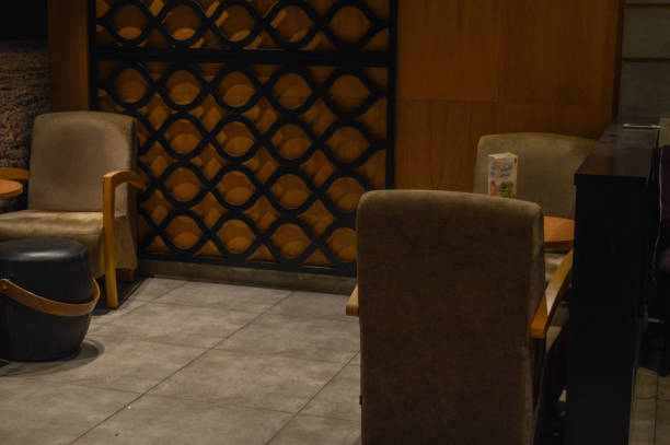 A interior look of cafe with black leather.