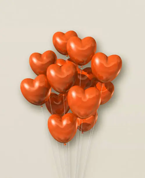 Orange heart shape air balloons group on a beige background. 3D illustration render