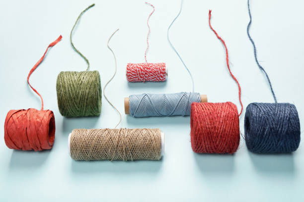 istock Different skeins of cords, twine, ropes for packaging and decoration 1273683565