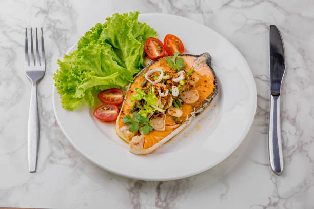 istock Spicy fried salmon salad 1273684598