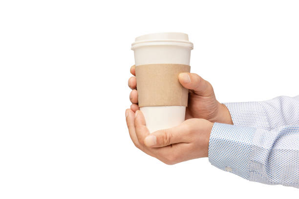 istock Man holding out a paper cup of coffee on white background 1273686185