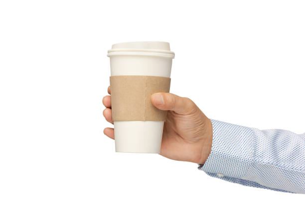 Man holding out a paper cup of coffee on white background