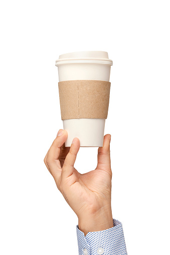 Man holding out a paper cup of coffee on white background