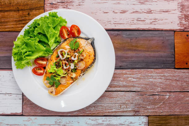 istock Spicy fried salmon salad 1273686501