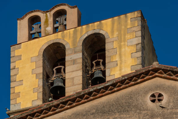 campane sul campanile di un tempio medievale cattolico - church bell tower temple catholicism foto e immagini stock