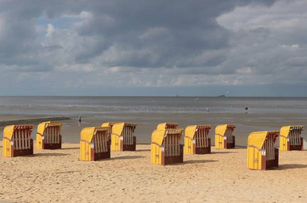 istock Beach chairs on a sandy beach by the North Sea. Cuxhaven. 1273687451