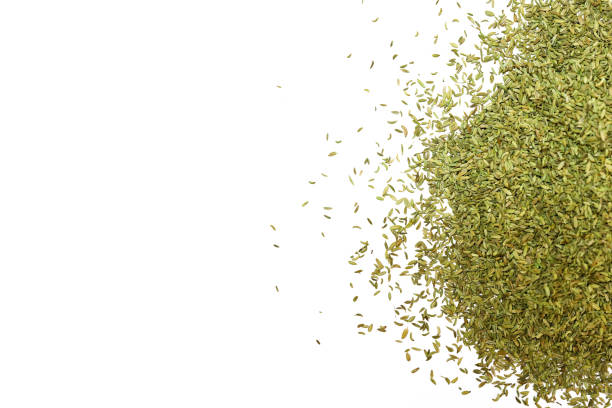 istock Green Pile of cumin seeds isolated on white background 1273687865