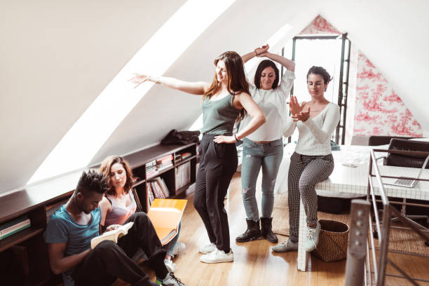 istock happiness friends doing an house party 1273692061