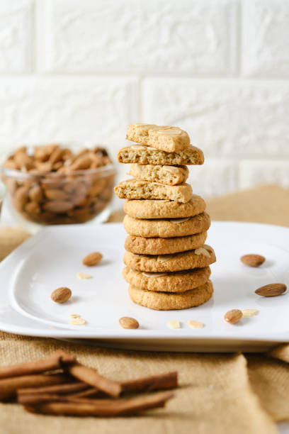 istock Stack of Gluten Free Almond Cookies set on white cafe table background. 1273692420
