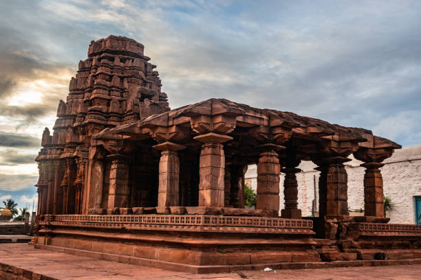 istock ancient temple with unique stone wall art and dramatic sky 1273697872