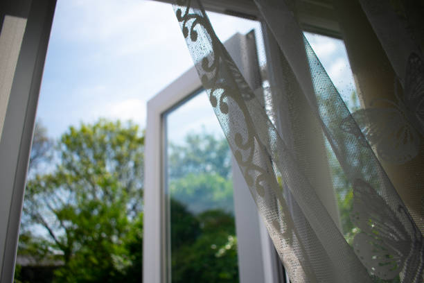 istock Open door with lace curtain 1273702620
