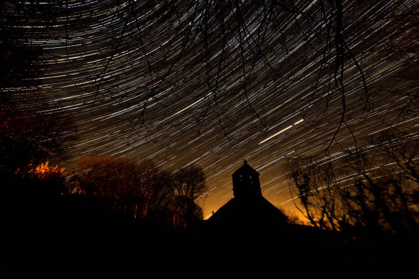 Star Trail, 13th Century Church in Silhouette in Llys-y-frân, Wales, United Kingdom