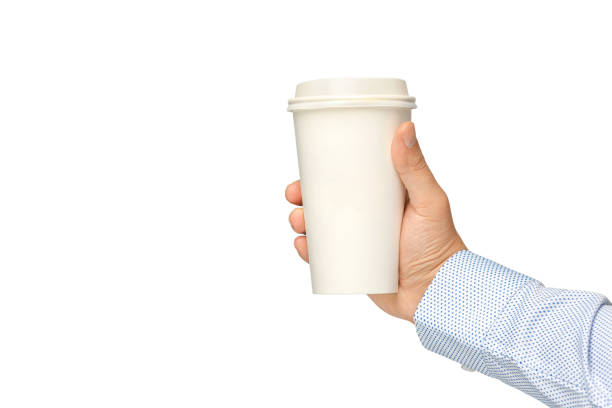 istock Man holding out a paper cup of coffee on white background 1273705271
