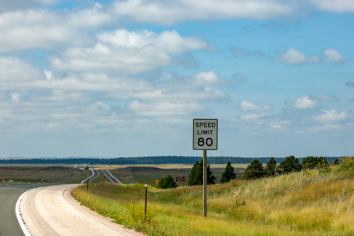Speed limit 80 MPH sign on interstate 90 in Wyoming, horizontal