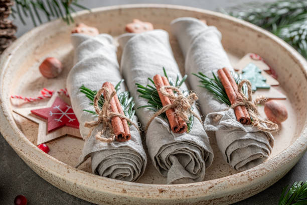 istock Handmade Christmas table setting with napkin and gingerbread cookies 1273707571
