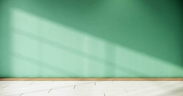 istock Mint wall background and white wooden floor on empty room. 3D rendering 1273707864