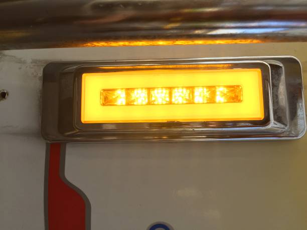 istock A large indicator light blinking in an orange color on a white background 1273711407