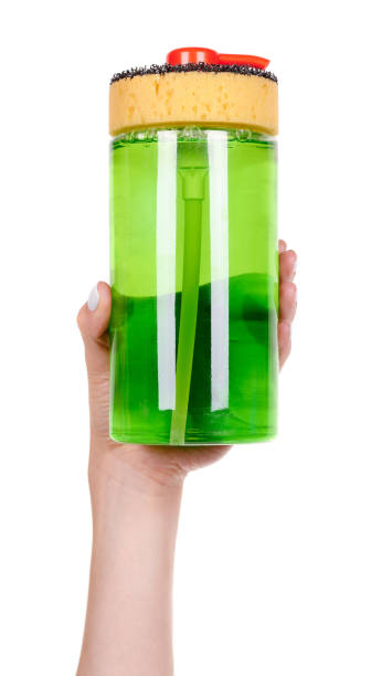 istock Hand with bottle with liquid soap for dish washing, isolated on white background. 1273711484